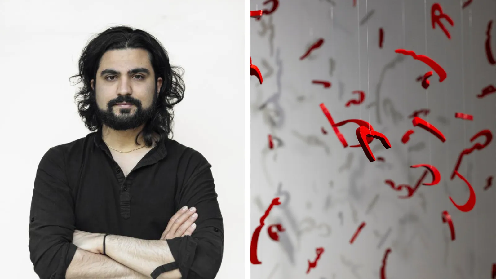 Photo of Illya beside his artwork, featuring hanging letters in Persian