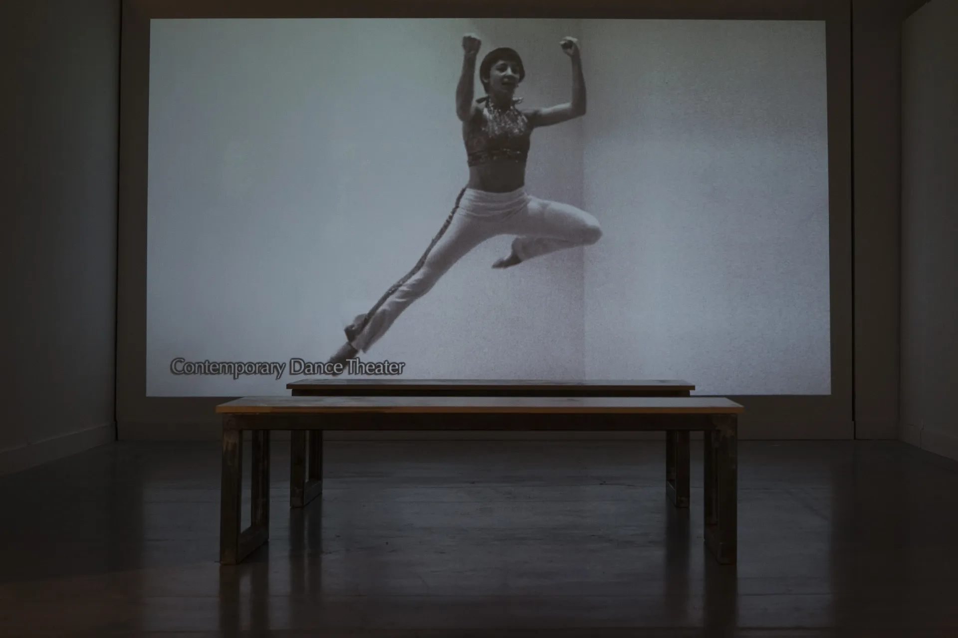 documentary film with a dancer leaping on screen