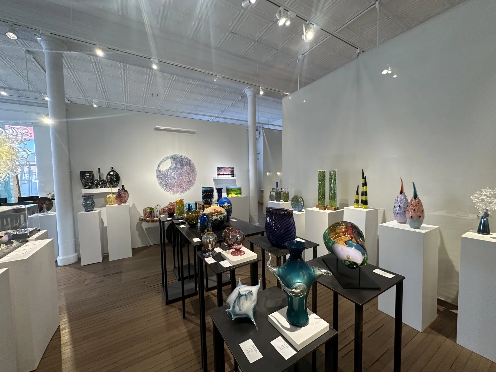 wide view of hawk galleries with glass sculptures