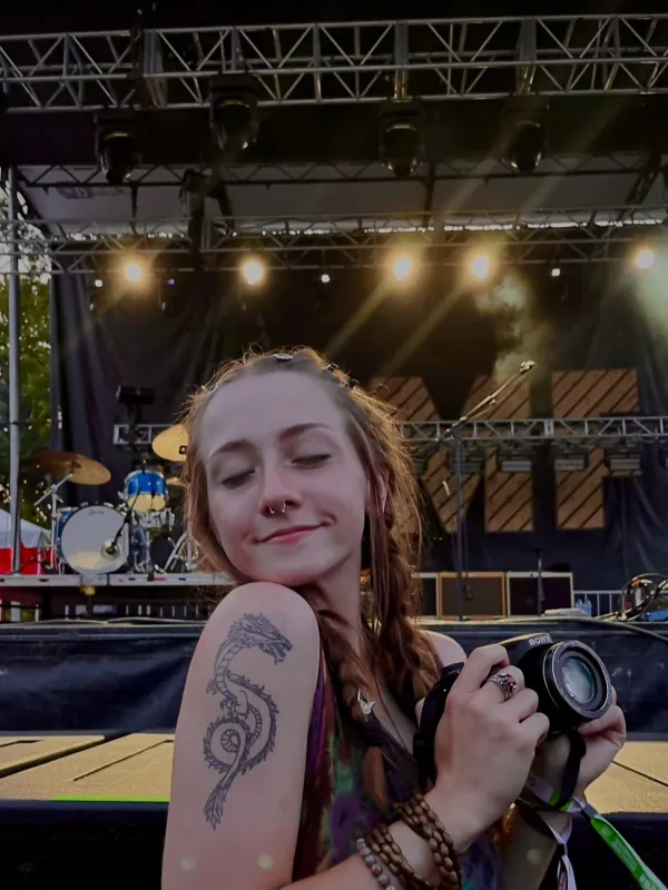 Sarah Jenkins holding a camera