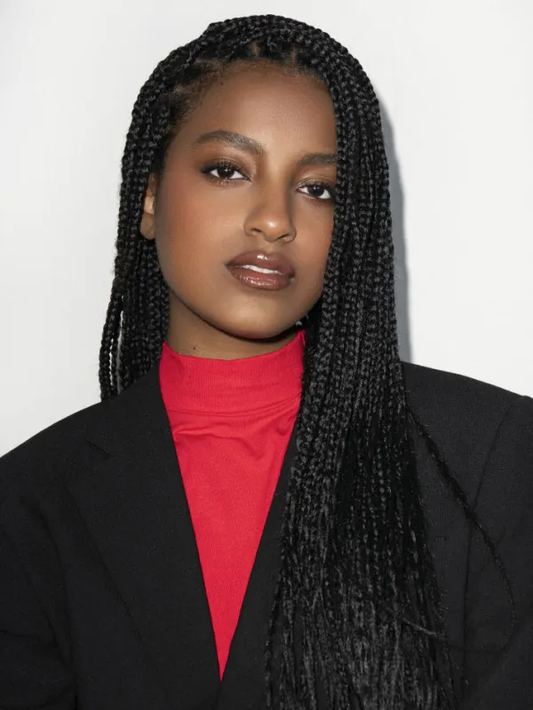 Ethiopia looking into the camera on a white background